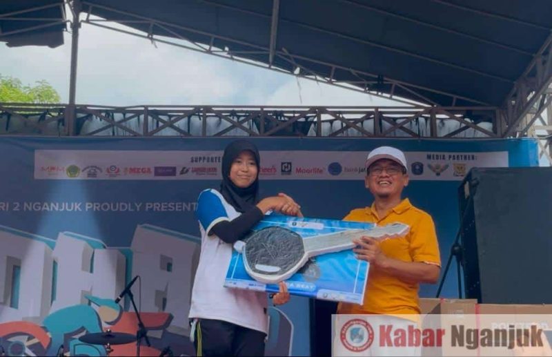 Pemenang kupon undian 1 buah motor beat.